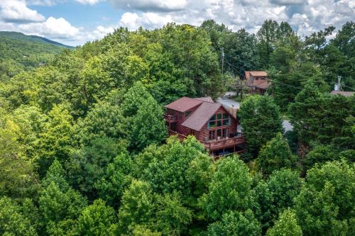 an aerial view of a house in the trees at A Mountain Dream in Rocky Grove