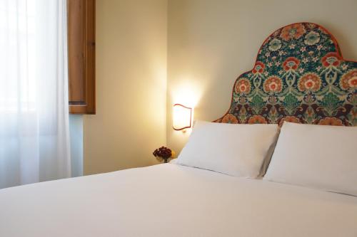 Katil atau katil-katil dalam bilik di Hotel Galileo