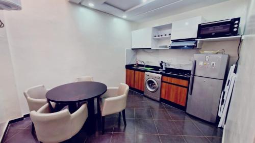 Kuchyň nebo kuchyňský kout v ubytování Appartement proche du centre