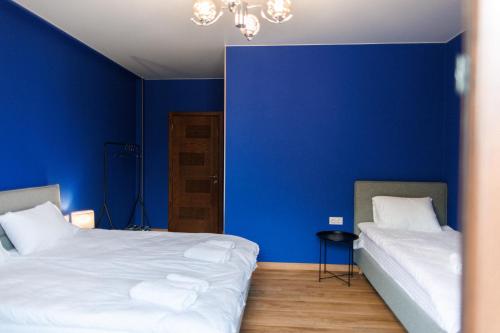 Postel nebo postele na pokoji v ubytování Kazbegi Estate
