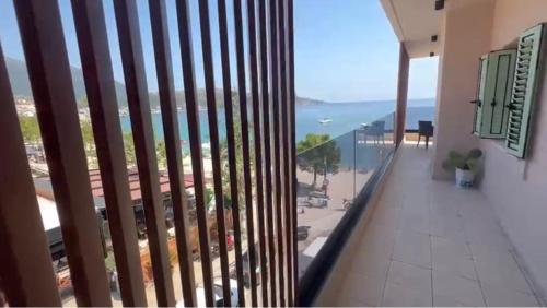 a balcony with a view of the ocean at Manolo & Jolie Luxury Villa in Himare