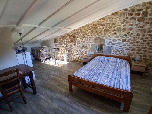 Ένα ή περισσότερα κρεβάτια σε δωμάτιο στο La Case
