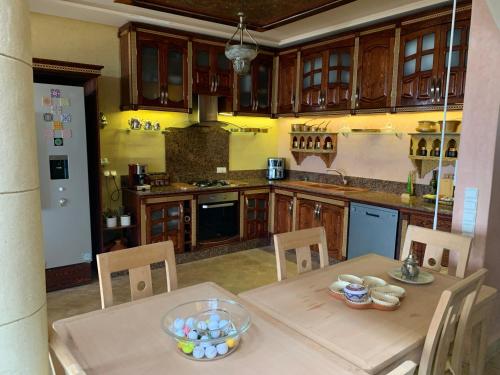 a kitchen with a table with a bowl of eggs on it at Riad eSSAOUIRA View in Essaouira