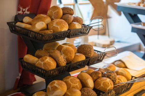 two baskets of pastries on display in a bakery at Boutique Hotel beim Lipp - Restaurant & Spa in Roßhaupten
