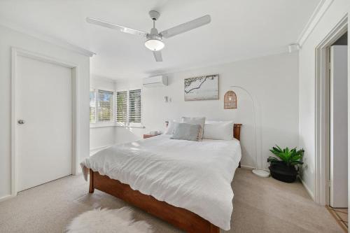 Ένα ή περισσότερα κρεβάτια σε δωμάτιο στο Slow MOcean Beach Retreat