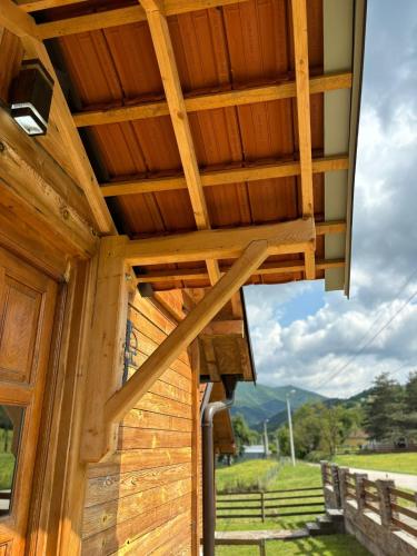 awning on the side of a wooden building at Vikendice Jovicic in Bukorovac