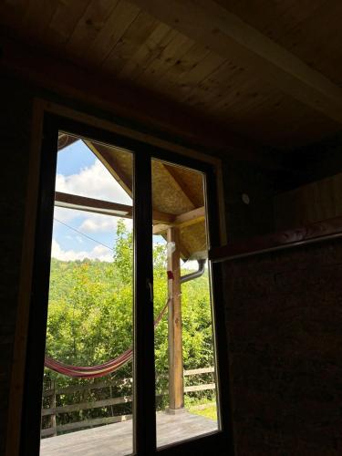 a window in a room with a view at Vikendice Jovicic in Bukorovac