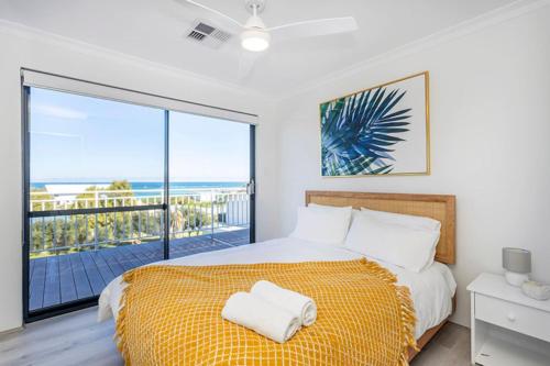 Ένα ή περισσότερα κρεβάτια σε δωμάτιο στο Wildwood, ocean views to the horizon