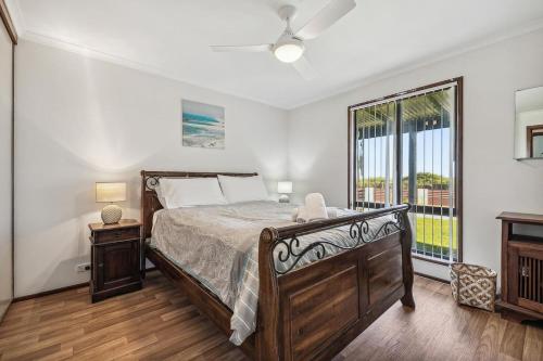 Ένα ή περισσότερα κρεβάτια σε δωμάτιο στο Classic Beach House Lancelin