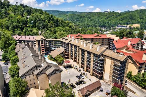 an aerial view of a resort with mountains in the background at Gatlinburg Town Square in Gatlinburg