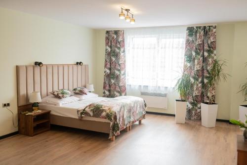 Postel nebo postele na pokoji v ubytování Agroturystyka Przy Wodospadzie