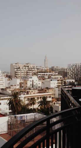 a view of a city from a balcony at Le Square By Onomo Collection in Casablanca