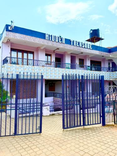 a building with a gate in front of it at Raha Luxe Stays 2 in Entebbe