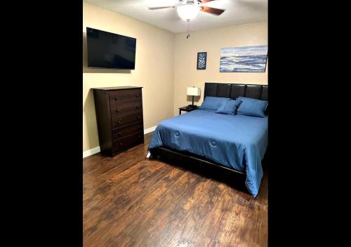 Voodi või voodid majutusasutuse Miami Court Cottage toas