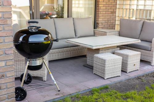 Kemudahan BBQ tersedia untuk tetamu di apartmen