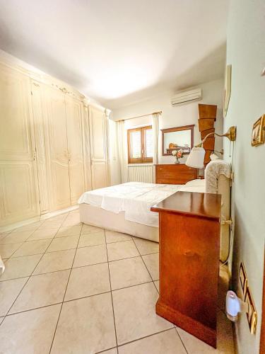 Cama o camas de una habitación en Villa Aurora Oasi Verde