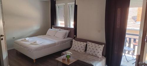 Katil atau katil-katil dalam bilik di Finesi Apartments 2