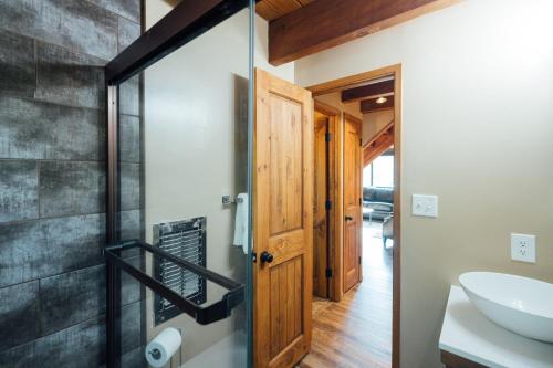 a bathroom with a sink and a mirror at The Refugio #2552 in Big Bear Lake