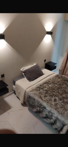 Кровать или кровати в номере Nice