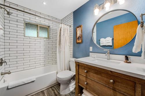 a bathroom with a sink toilet and a mirror at Mt Doble Dream Home #504 in Big Bear City