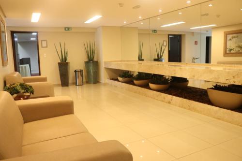 Χώρος καθιστικού στο Indaiá Park Hotel