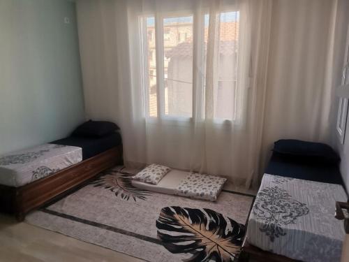 Ένα ή περισσότερα κρεβάτια σε δωμάτιο στο Appartement indépendant de villa