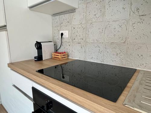 Kuchyň nebo kuchyňský kout v ubytování Cà dé Chiarè - Monolocale