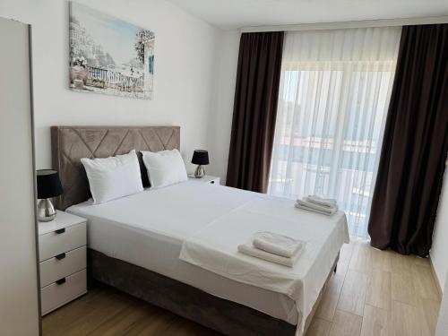 Ένα ή περισσότερα κρεβάτια σε δωμάτιο στο Apartments Paris