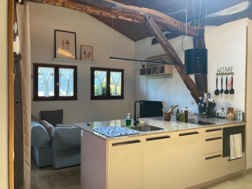 a kitchen with a counter top in a room at BIDEARTEAN, Caserío vasco, Recién reformado in Záitegui