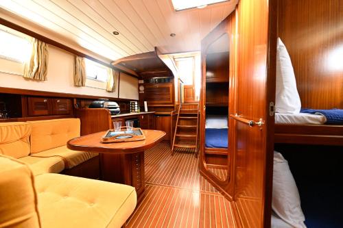 a small room with a table and a couch at Sea Dreams I in Nassau