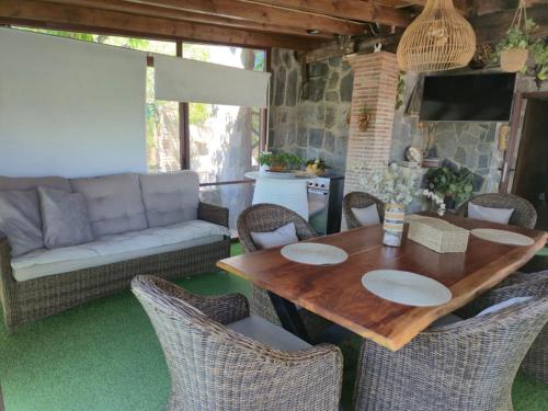 TV a/nebo společenská místnost v ubytování La casita encantada