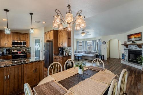 a kitchen and dining room with a table and chairs at Tranquil Get Away with Lake Views in Lake Havasu City