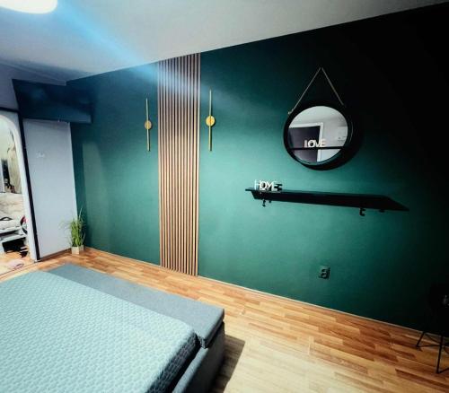 En eller flere senge i et værelse på Apartament Gossip XOXO