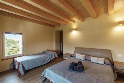 Agriturismo Saettàにあるベッド
