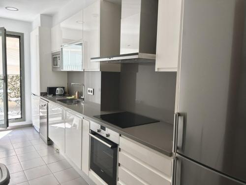 Η κουζίνα ή μικρή κουζίνα στο Reina apartment in Sitges