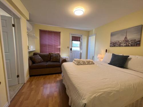 Кровать или кровати в номере Lee's Ocean Peek B & B