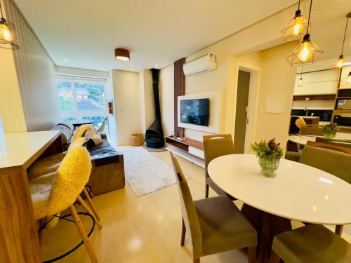 Televisyen dan/atau pusat hiburan di Apartamento Sonhos - Borges de Medeiros Canela