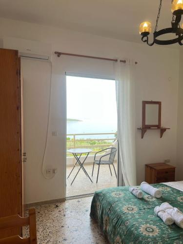 Ένα ή περισσότερα κρεβάτια σε δωμάτιο στο Appartements in Epidaurus Yialassi