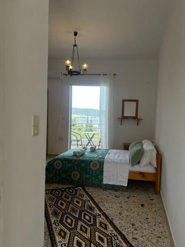Ένα ή περισσότερα κρεβάτια σε δωμάτιο στο Appartements in Epidaurus Yialassi