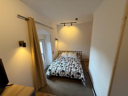 En eller flere senge i et værelse på Lotila Flats Lastres