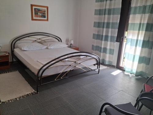 Ένα ή περισσότερα κρεβάτια σε δωμάτιο στο Zorin House Rooms
