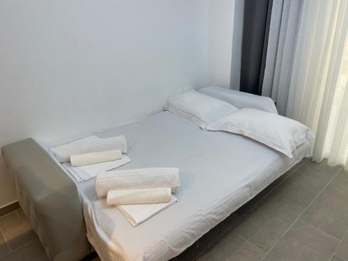 Ένα ή περισσότερα κρεβάτια σε δωμάτιο στο Modern Seaview Apartments
