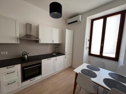 Kuchyň nebo kuchyňský kout v ubytování Casa Ventuno