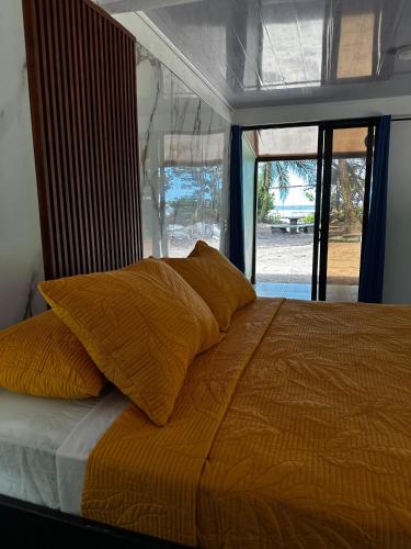 Ein Bett oder Betten in einem Zimmer der Unterkunft Caribbean View House
