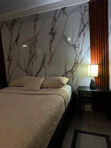 Ein Bett oder Betten in einem Zimmer der Unterkunft Caribbean View House