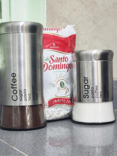 a group of three metal containers sitting on a counter at KERY-OASIS 2bdr with pool close to the Beach in Las Terrenas