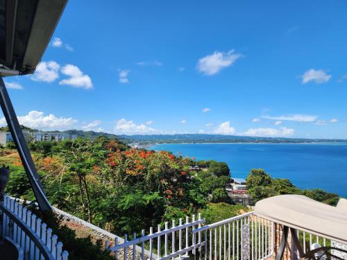 a balcony with a view of the water at Hotel Vista Azul in Aguadilla