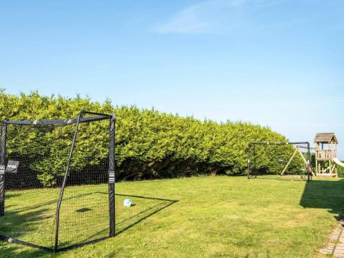 two goal nets in a field with at Luxury Lodge with Limfjord View - By Traum Ferienwohnungen in Spottrup
