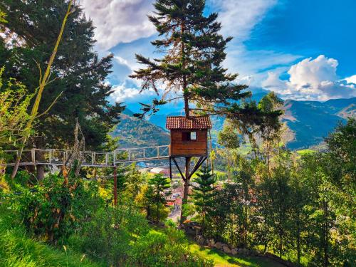 a bird house in the middle of a forest at Mirador Turístico Guachaventura 