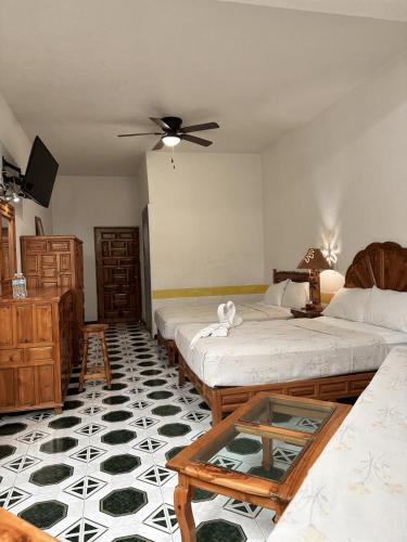 Cama o camas de una habitación en Hotel Fiesta Palmar